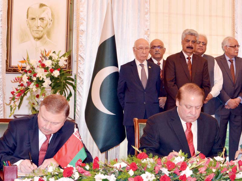 premier nawaz and belarus pm andrey kobyakov sign an mou photo inp