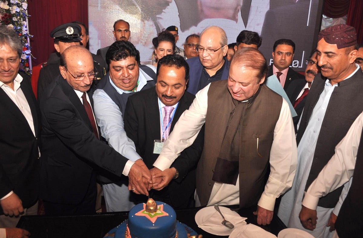 prime minister nawaz sharif cuts a cake as part of the diwali celebrations in karachi on november 11 2015 photo pid