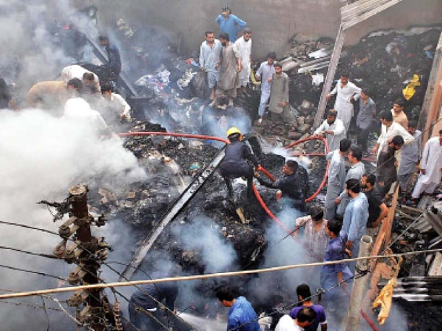 firefighters work to put out a fire that broke out in a clothes godown at landa bazaar no one was injured during the fire photo online firefighters work to put out a fire that broke out in a clothes godown at landa bazaar no one was injured during the fire photo online
