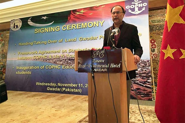 planning minister ahsan iqbal addressing the signing ceremony to hand over first 600 acres of land for gwadar free zone photo app