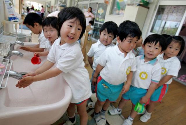 nursery school children wash their hands before eating lunch at hinagiku nursery in moriyama western japan may 27 2008 photo reuters