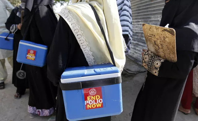 polio vaccinators carry boxes of polio vaccine drops as they head to the areas they have been appointed to administer the vaccine in karachi on october 21 2014 photo reuters polio vaccinators carry boxes of polio vaccine drops as they head to the areas they have been appointed to administer the vaccine in karachi on october 21 2014 photo reuters