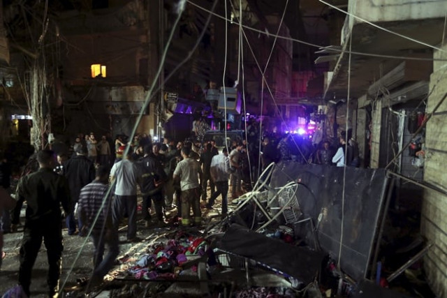 residents inspect damaged area caused by two explosions in beirut 039 s southern suburbs on november 12 2015 photo reuters residents inspect damaged area caused by two explosions in beirut 039 s southern suburbs on november 12 2015 photo reuters