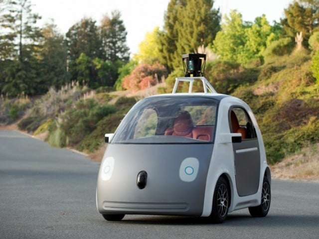 google playfully posted a photo of a motorcycle cop pulling over one of it self driving cars photo afp