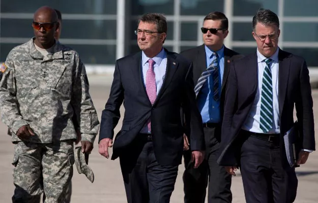 file picture shows us defence secretary ashton carter c with chief of staff eric rosenbach r and lieutenant general ron lewis l at queen alia airport in amman photo afp file picture shows us defence secretary ashton carter c with chief of staff eric rosenbach r and lieutenant general ron lewis l at queen alia airport in amman photo afp