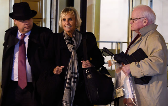 rebekah j poston c and john j reilly r attorneys for efrain antonio campo flores leave the us federal courthouse on november 12 2015 in new york photo afp