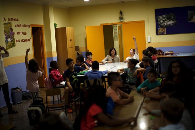 children attend a programme that gives them academic and psychological help to improve their chances in life at a catholic charity caritas centre in the neighborhood of puente tocinos near murcia southeast spain on november 3 2015 photo reuters