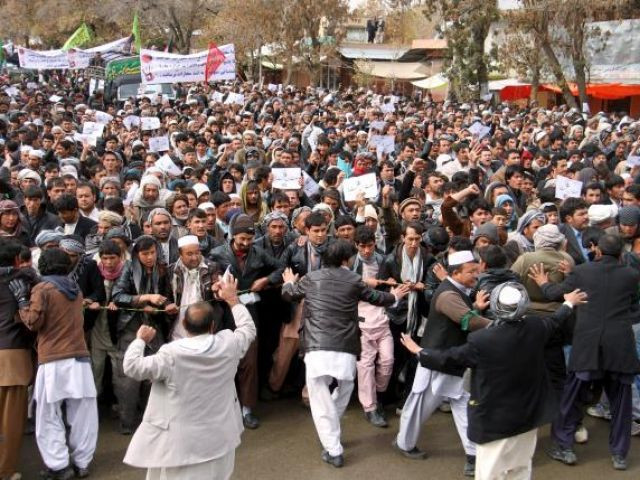 afghan men protest to condemn the killing of seven hazara ethnic minority that were kidnapped and killed by islamic state militants in ghazni province afghanistan november 10 2015 photo reuters afghan men protest to condemn the killing of seven hazara ethnic minority that were kidnapped and killed by islamic state militants in ghazni province afghanistan november 10 2015 photo reuters