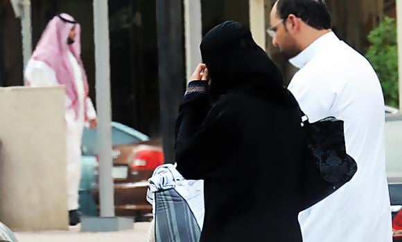 in this file photo a saudi couple walk in riyadh photo afp