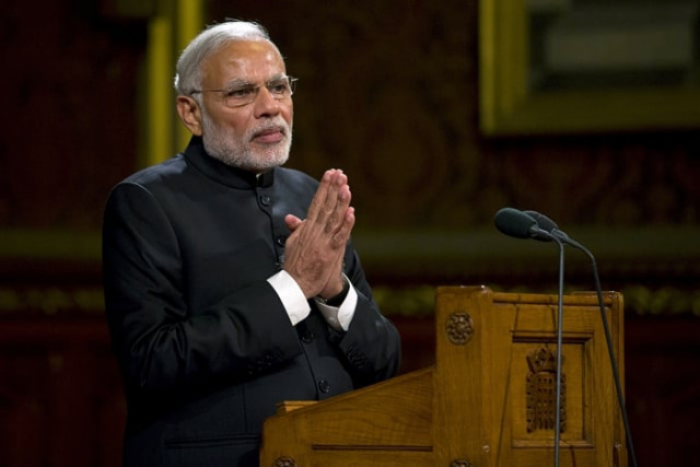 narendra modi gestures to members of britain 039 s parliament and invited guests in the royal gallery at the houses of parliament in central london november 12 2015 photo reuters narendra modi gestures to members of britain 039 s parliament and invited guests in the royal gallery at the houses of parliament in central london november 12 2015 photo reuters