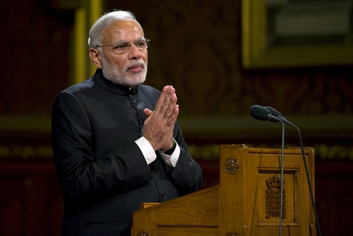 narendra modi gestures to members of britain 039 s parliament and invited guests in the royal gallery at the houses of parliament in central london november 12 2015 photo reuters