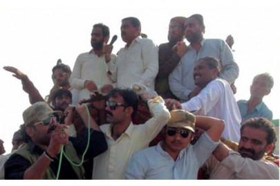 pml f supporters lay token siege against pre poll rigging pml f supporters lay token siege against pre poll rigging