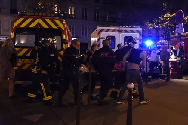 rescuers workers evacuate victims near the bataclan concert hall in central paris on november 13 2015 a number of people were killed and others injured in a series of gun attacks across paris as well as explosions outside the national stadium where france was hosting germany photo afp rescuers workers evacuate victims near the bataclan concert hall in central paris on november 13 2015 a number of people were killed and others injured in a series of gun attacks across paris as well as explosions outside the national stadium where france was hosting germany photo afp