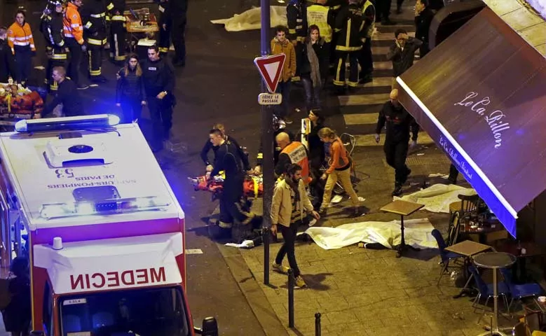 french fire brigade members aid an injured individual near the bataclan concert hall following fatal shootings in paris france november 13 2015 photo reuters french fire brigade members aid an injured individual near the bataclan concert hall following fatal shootings in paris france november 13 2015 photo reuters