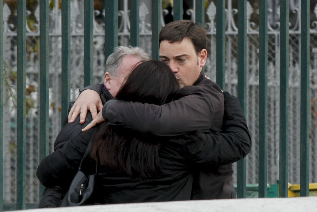 relatives and friends comfort each at the institut medico legal of paris where bodies have been brought to the morgue photo afp relatives and friends comfort each at the institut medico legal of paris where bodies have been brought to the morgue photo afp