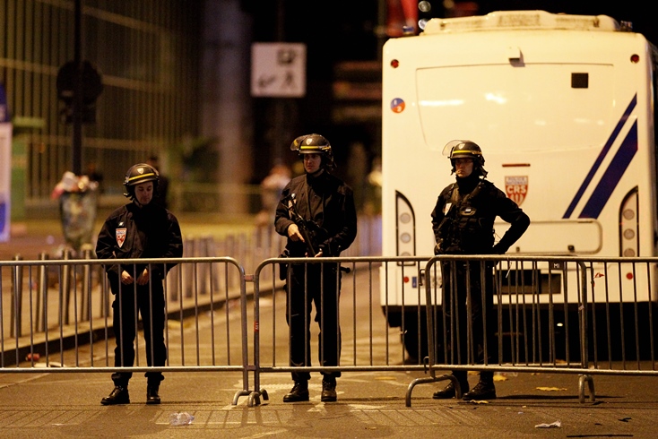 police officers man a cordon at the scene of an attack near the stade de france in saint denis suburban paris on november 13 2015 photo afp