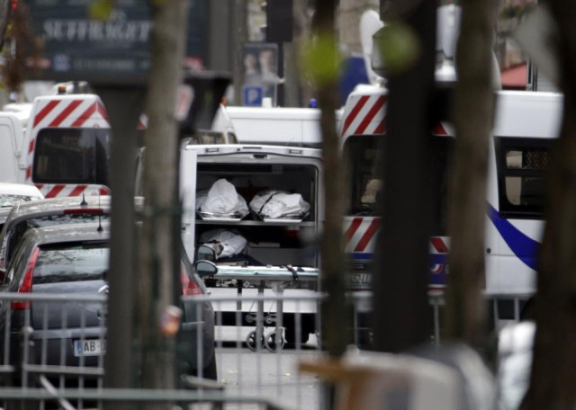 bodies are evacuated near the bataclan theatre in the 11th district of paris on november 14 2015 photo afp bodies are evacuated near the bataclan theatre in the 11th district of paris on november 14 2015 photo afp