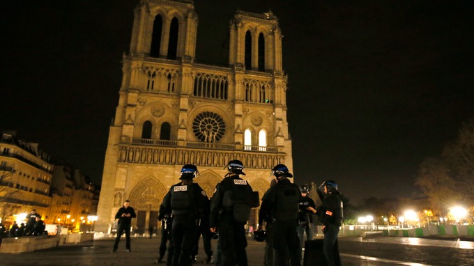 police patrol near notre dame cathedral in paris following the attacks photo reuters