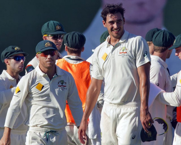 australia 039 s paceman mitchell starc hatless celebrates with teammates after taking the wicket of new zealand batsman bj watling during day three of the second test cricket match between australia and new zealand in perth on november 15 2015 photo afp australia 039 s paceman mitchell starc hatless celebrates with teammates after taking the wicket of new zealand batsman bj watling during day three of the second test cricket match between australia and new zealand in perth on november 15 2015 photo afp