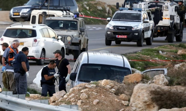 israeli soldiers beside the car that was ambushed in the west bank photo epa israeli soldiers beside the car that was ambushed in the west bank photo epa