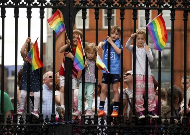 children wave rainbow flags as they stand with their same sex marriage supporting parents at dublin castle in dublin ireland may 23 2015 photo reuters children wave rainbow flags as they stand with their same sex marriage supporting parents at dublin castle in dublin ireland may 23 2015 photo reuters