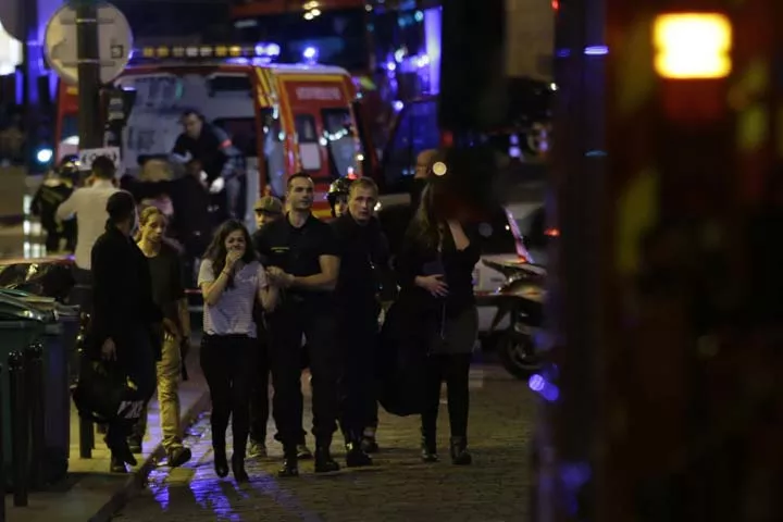 people are evacuated following an attack at the bataclan concert venue in paris on november 13 2015 at least 18 people were killed in multiple attacks in paris friday including one near the stade de france sports stadium photo afp people are evacuated following an attack at the bataclan concert venue in paris on november 13 2015 at least 18 people were killed in multiple attacks in paris friday including one near the stade de france sports stadium photo afp