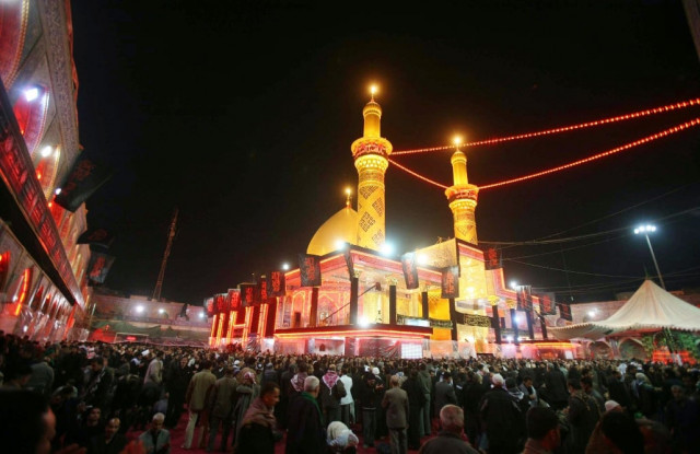muslim shia pilgrims gather outside the hazrat abbas as shrine in the holy city of karbala central iraq during ashura commemorations photo afp file muslim shia pilgrims gather outside the hazrat abbas as shrine in the holy city of karbala central iraq during ashura commemorations photo afp file