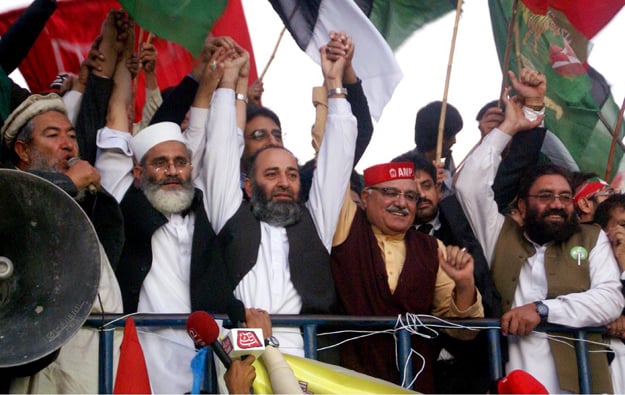 leaders of ploiticial parties join hands to show solidarity in haqooq e fata rally at d chowk photo inp