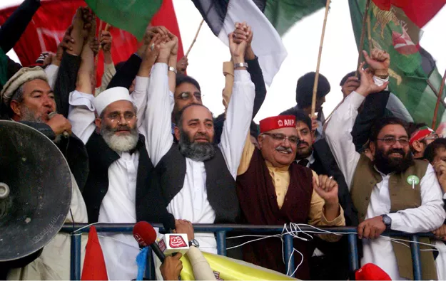 leaders of ploiticial parties join hands to show solidarity in haqooq e fata rally at d chowk photo inp leaders of ploiticial parties join hands to show solidarity in haqooq e fata rally at d chowk photo inp