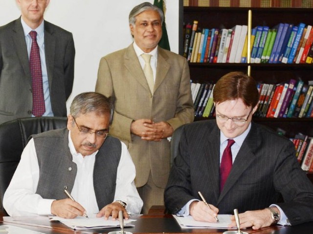 a file photo of tariq bajwa and head of dfid pakistan richard montgomery singing an mou on cooperation photo pid