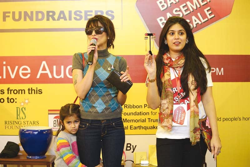 meesha shafi and khadija a malik auctioning prerto earrings worn by sonam kapoor photos publicity