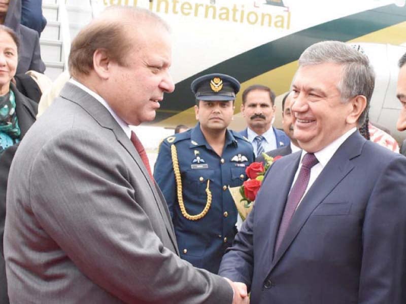 premier nawaz being received by uzbek prime minister shavkat mirziyoyev photo inp