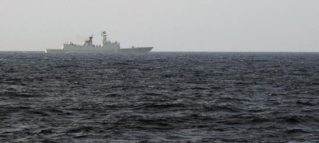 this picture taken from a vietnam coast guard ship on may 13 2014 shows a china navy ship sailing in the south china sea photo afp