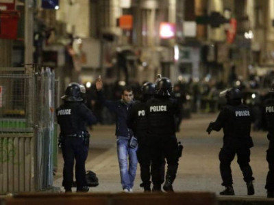 man held in paris raid lent apartment to two from belgium