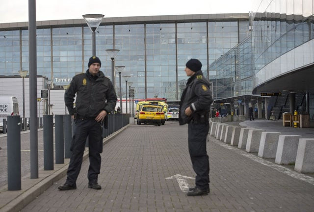 policemen stand outside terminal 3 at kastrup airport in copenhagen on november 18 2015 photo afp policemen stand outside terminal 3 at kastrup airport in copenhagen on november 18 2015 photo afp