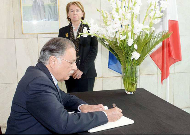 senator pervaiz rashid visits french embassy to convey condolences on paris tragedy photo inp