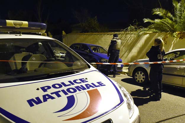 police secure the near where a man was injured in a stabbing on november 18 2015 in the southern city of marseille a teacher at a jewish school in the southern french city of marseille was stabbed by three people shouting anti semitic obscenities and expressing support for the islamic state group local authorities said the 57 year old victim who was wearing a kippa was attacked outside his home a short distance from the school and synagogue complex a source close to the investigation said photo afp