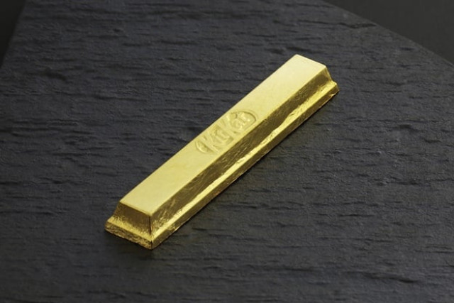 this handout picture released from food maker nestle japan on november 19 2015 shows a gold kitkat chocolate bar which will go on sale in japan later this month with a price of 2 016 yen 16 us dollar photo afp this handout picture released from food maker nestle japan on november 19 2015 shows a gold kitkat chocolate bar which will go on sale in japan later this month with a price of 2 016 yen 16 us dollar photo afp