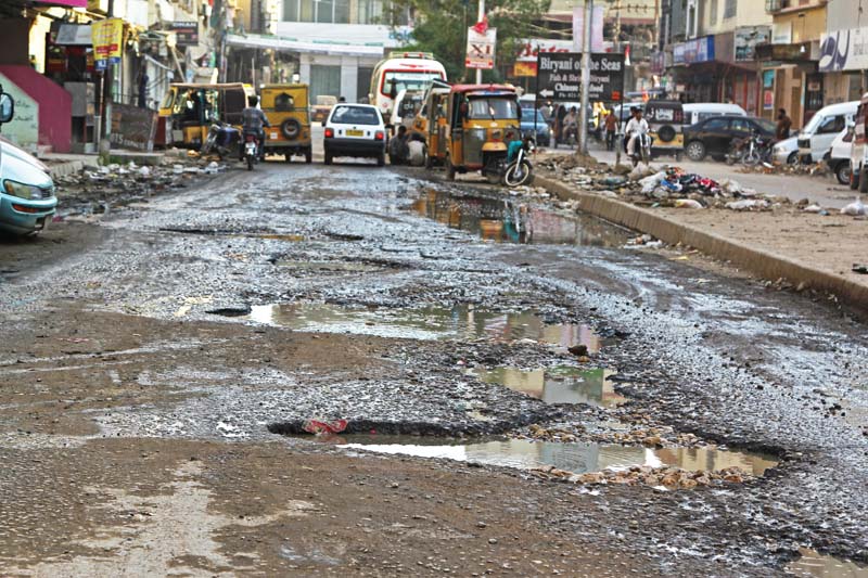 mehmoodabad residents claim that since the last 10 years the streets have been inundated with sewage photo aysha saleem express