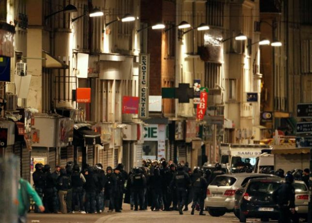 french special police forces secure the area as shots are exchanged in saint denis france near paris november 18 2015 photo reuters french special police forces secure the area as shots are exchanged in saint denis france near paris november 18 2015 photo reuters