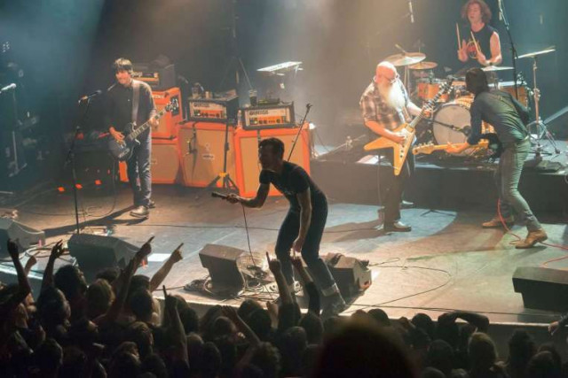 eagles of death metal on stage at the bataclan concert hall in paris on november 13 2015 photo afp eagles of death metal on stage at the bataclan concert hall in paris on november 13 2015 photo afp