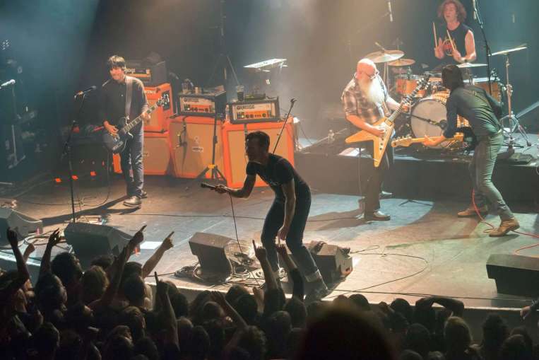 eagles of death metal on stage at the bataclan concert hall in paris on november 13 2015 photo afp