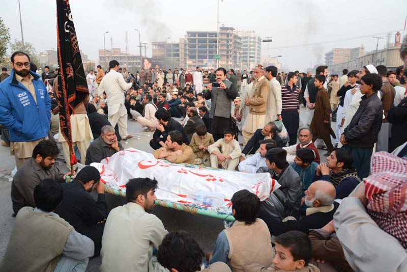 protesters block the road following anp leader s killing photo muhammad iqbal express
