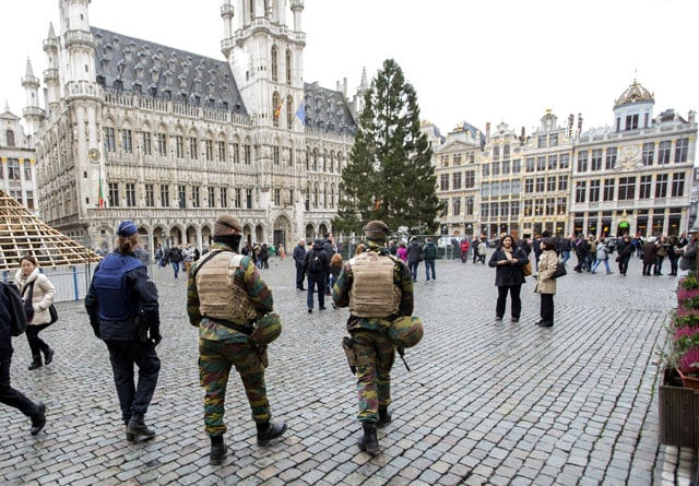 belgian soldiers and police patrol on brussels grand place after security was tightened in belgium following the fatal attacks in paris on friday in brussels belgium on nov 20 2015 photo afp belgian soldiers and police patrol on brussels grand place after security was tightened in belgium following the fatal attacks in paris on friday in brussels belgium on nov 20 2015 photo afp