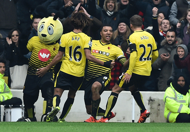 troy deeney 2nd r celebrates with teammates after scoring his goal during the match between watford and manchester united at vicarage road stadium in watford on november 21 2015 photo afp