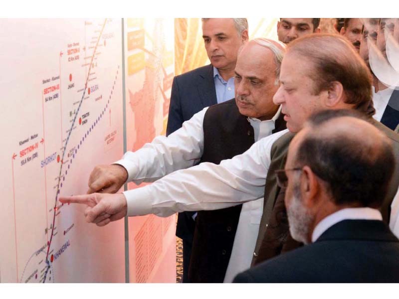 pm studies the layout for the khanewal multan section of m4 motorway photo nni