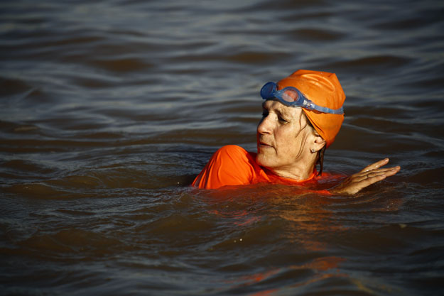 dutch ambassador in sudan susan blankhart swims across the blue nile in the capital khartoum on november 21 2015 as part of an event she organised in conjunction with charities that raise awareness against drowning and teach people safe swimming photo afp