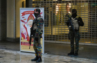 brussels hunts for suspects as lockdown enters second day