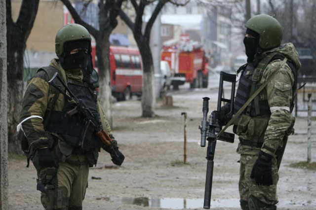 members of russia 039 s special forces stand guard during an operation on suspected militants in makhachkala the capital of russia 039 s north caucasus republic of dagestan january 20 2014 photo reuters