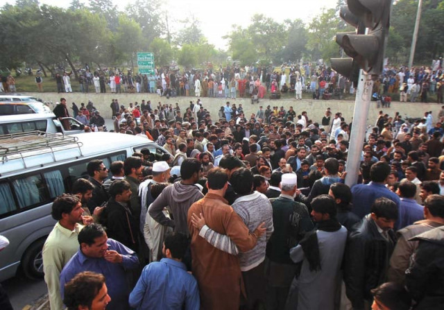 locals placed sagheer s body on the islamabad expressway blocking it for several hours photo waseem nazir express
